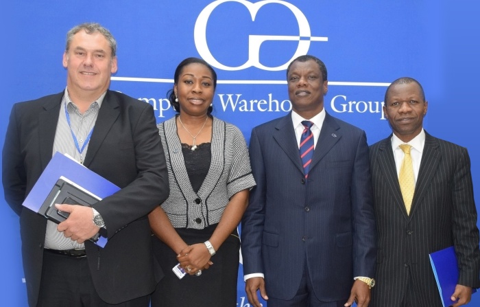 L-R: Mr. Klaas Kruger, Group Chief Information Officer, Standard Bank Plc; Mrs. Ruby Onwudiwe, Chief Information Officer, Stanbic IBTC; Mr. Austin Okere, Founder and Chief Executive Officer, CWG Plc and Mr. Wole Adeniyi, Executive Director, Business support, Stanbic IBTC at the corporate head office of CWG Plc, in Lagos